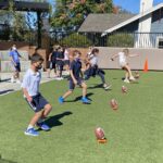 kids playing football