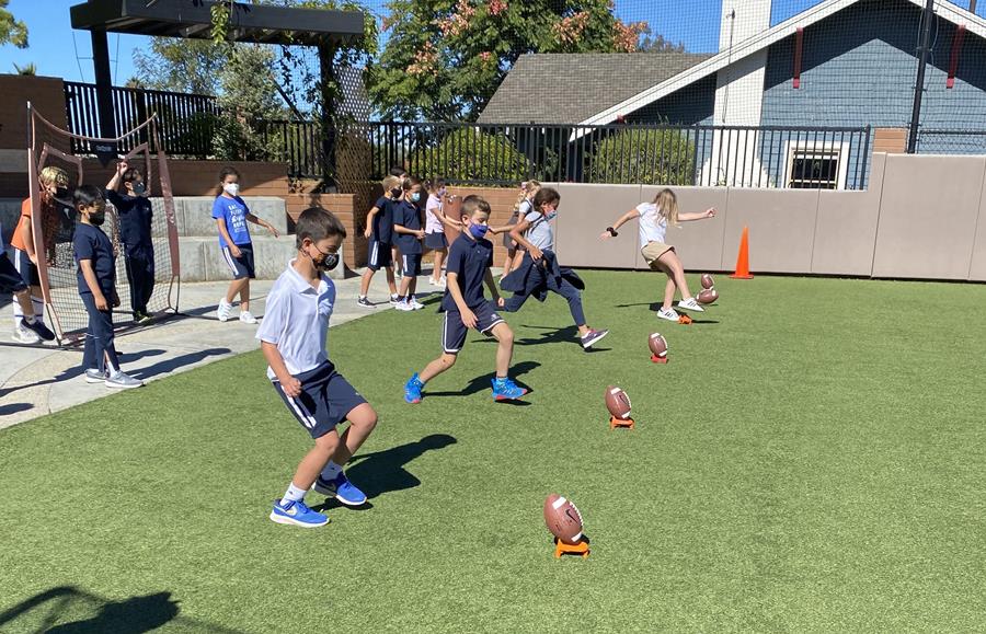 kids playing football