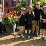 kids with tulips