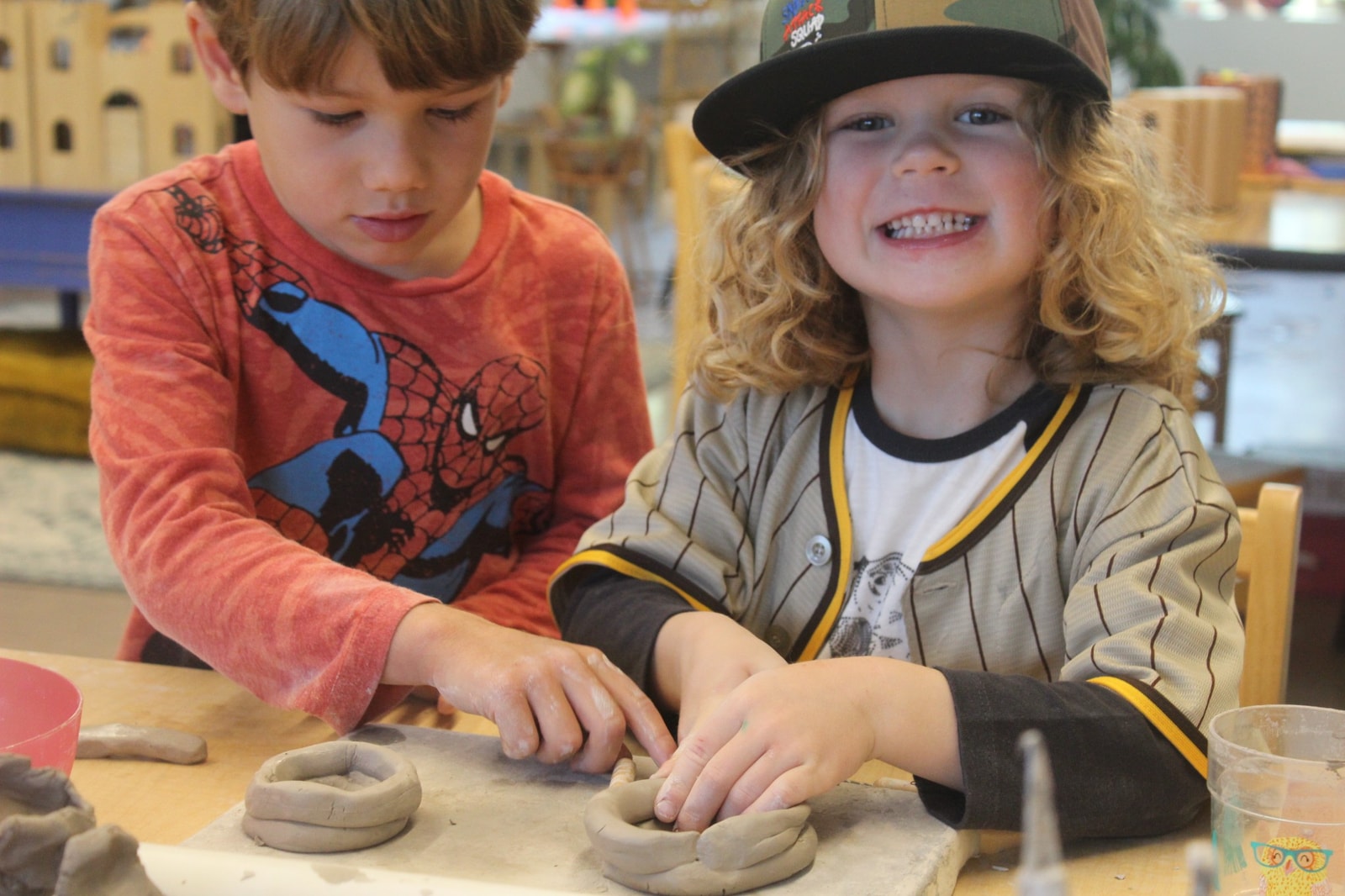 KIDS WORKING WITH CLAY