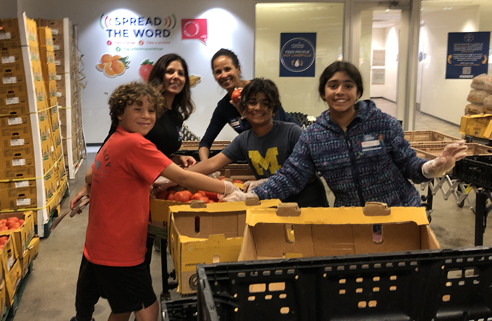 kids stacking produce