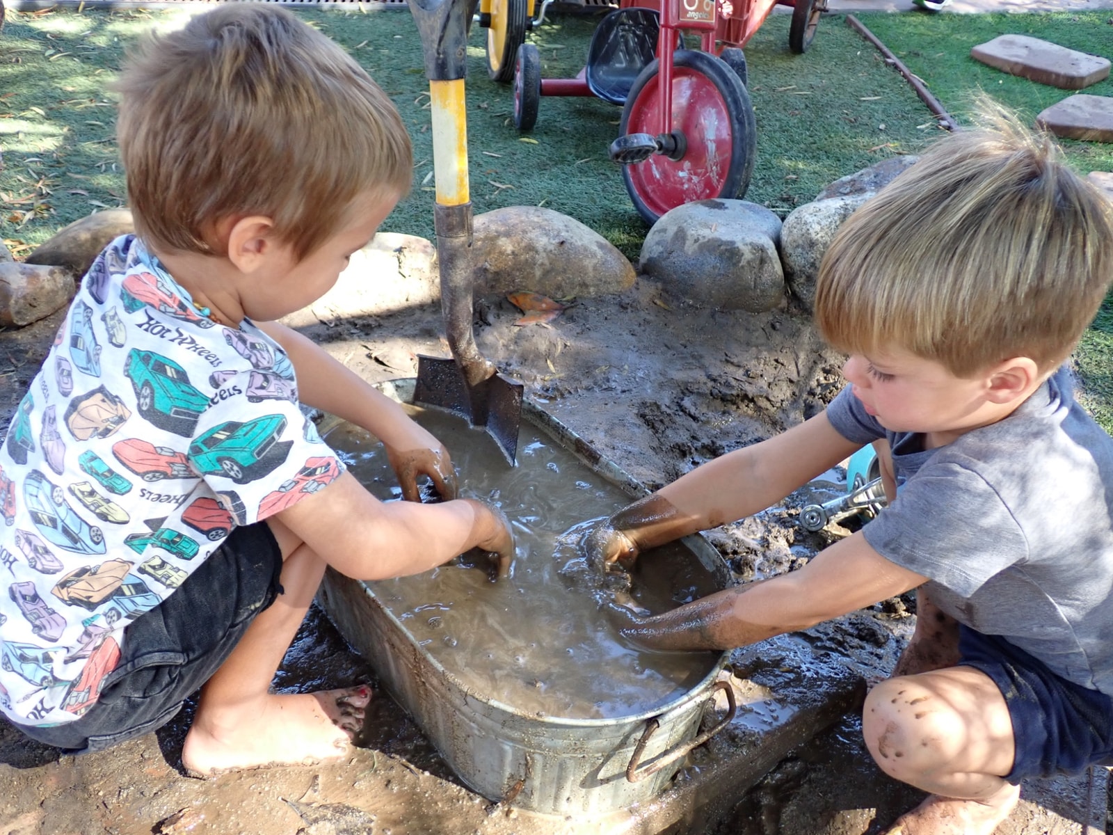Gillispie Students Playing in the Mud in the Outdoor Classroom