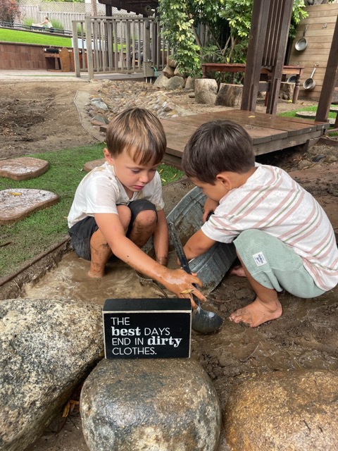 Gillispie Students Playing in the Mud in the Outdoor Classroom