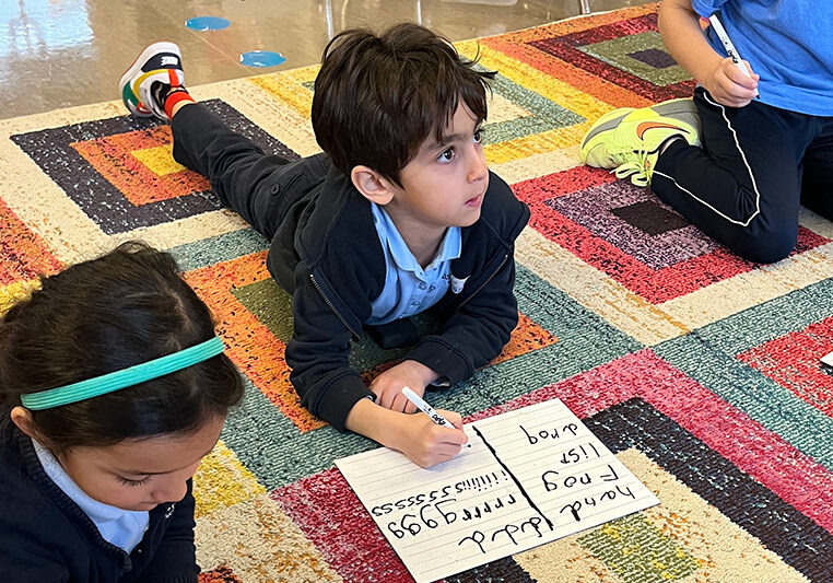 Gillispie Kindergarten student learns to write