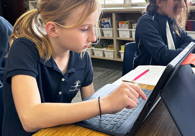 Grade 3 Gillispie student works on an iPad